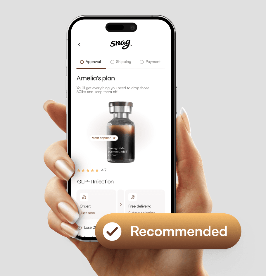 A hand holding a smartphone against a neutral gray background, displaying a mobile health app interface. The screen shows a personalized plan titled Amelia's plan for a GLP-1 injection, featuring a 3D render of a medical vial with a teal and navy logo. Above the phone, a large teal floating button with a white checkmark icon reads Recommended. The UI design is minimalist with teal accents and includes progress indicators for Approval, Shipping, and Payment.