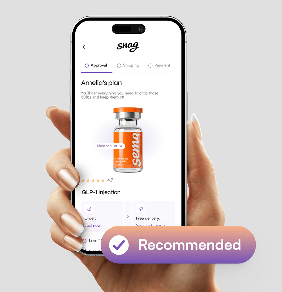 A hand holding a smartphone against a neutral gray background, displaying a mobile health app interface. The screen shows a personalized plan titled Amelia's plan for a GLP-1 injection, featuring a 3D render of a medical vial with a teal and navy logo. Above the phone, a large teal floating button with a white checkmark icon reads Recommended. The UI design is minimalist with teal accents and includes progress indicators for Approval, Shipping, and Payment.